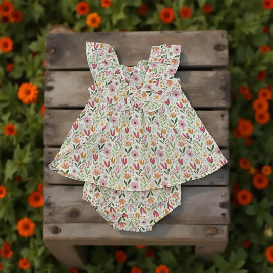 Abito estivo neonata con culotte Y-Clù con stampa floreale colorata e volant sulle spalle