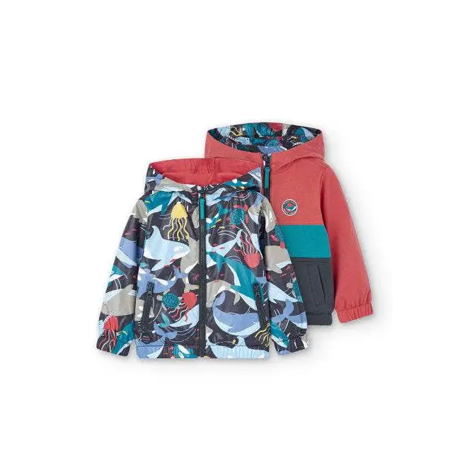giubbotto reversibile bambino Boboli in tessuto leggero con cappuccio zip e stampa mare colorata su un lato