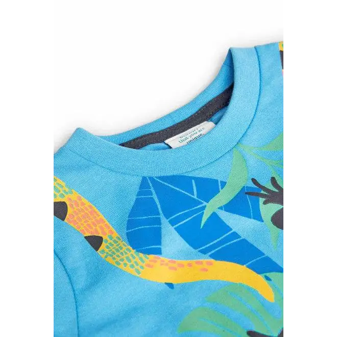 maglietta stampata bambino Boboli azzurra in cotone con stampa tropicale colorata e collo rotondo