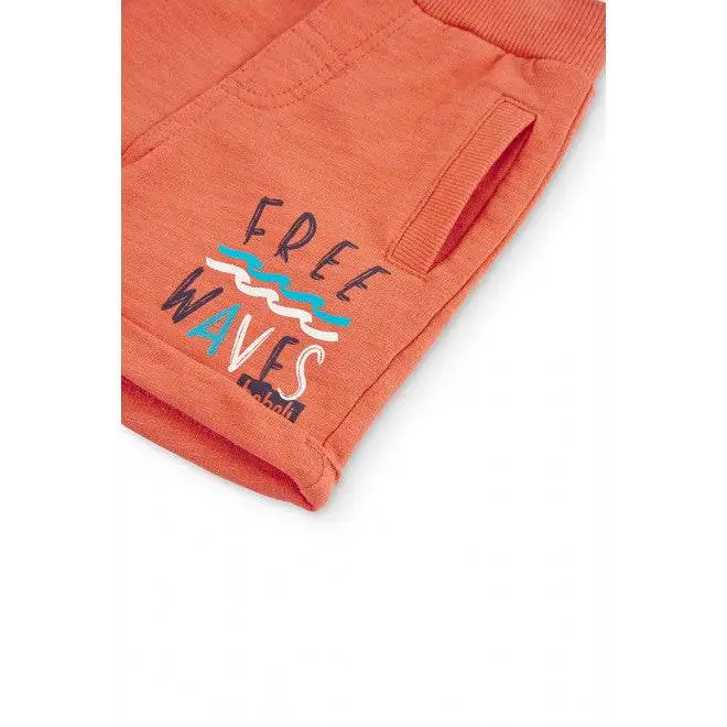 pantaloncini bimbo estivi Boboli corti color corallo in cotone con elastico in vita tasca laterale e stampa Free Waves