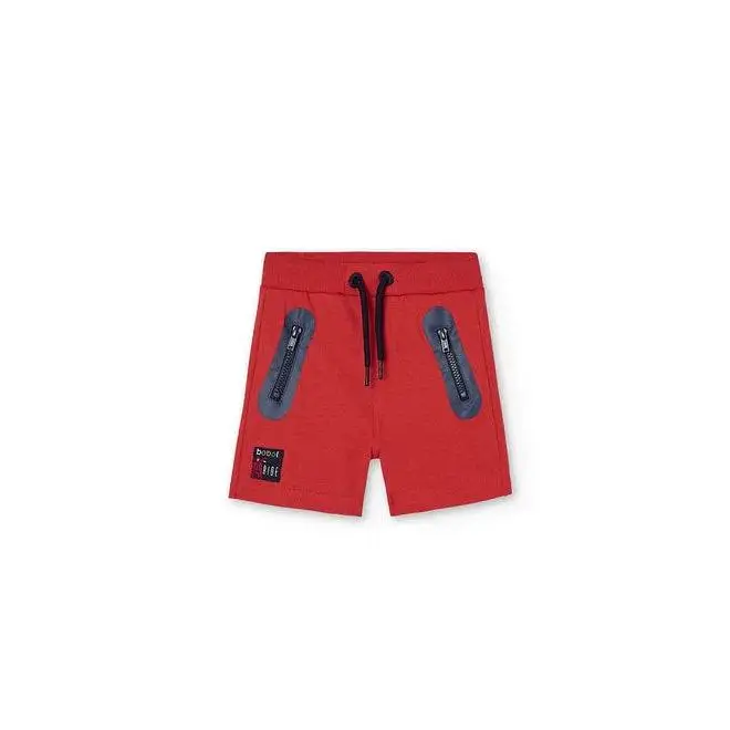 pantaloncini rossi bambino Boboli con coulisse nera e tasche con zip blu comodi per giochi estivi