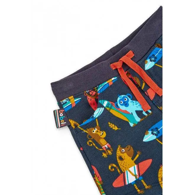 pantaloni bambino Boboli blu scuro con vita elasticizzata e coulisse rossa stampa animali surf colorati
