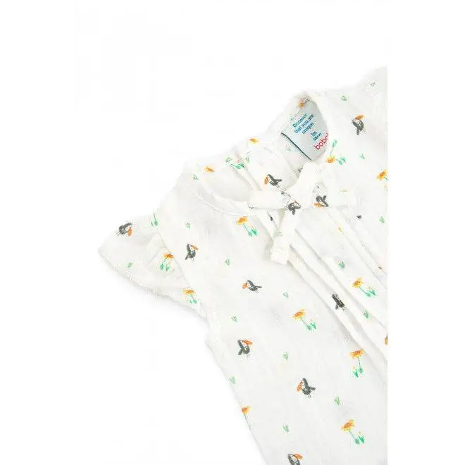 tutina corta neonato Boboli in mussola di cotone bianco con stampa fiori e uccellini maniche a volant e fiocco frontale