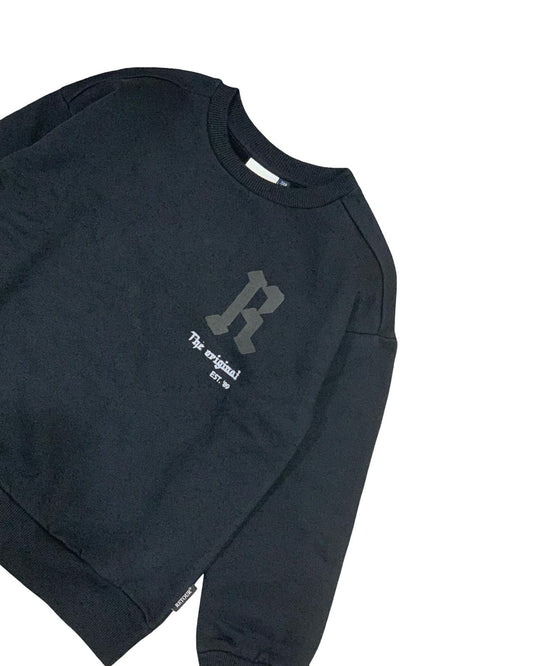 Felpa nera bambino trendy di Retour con logo R e scritta originale sul petto