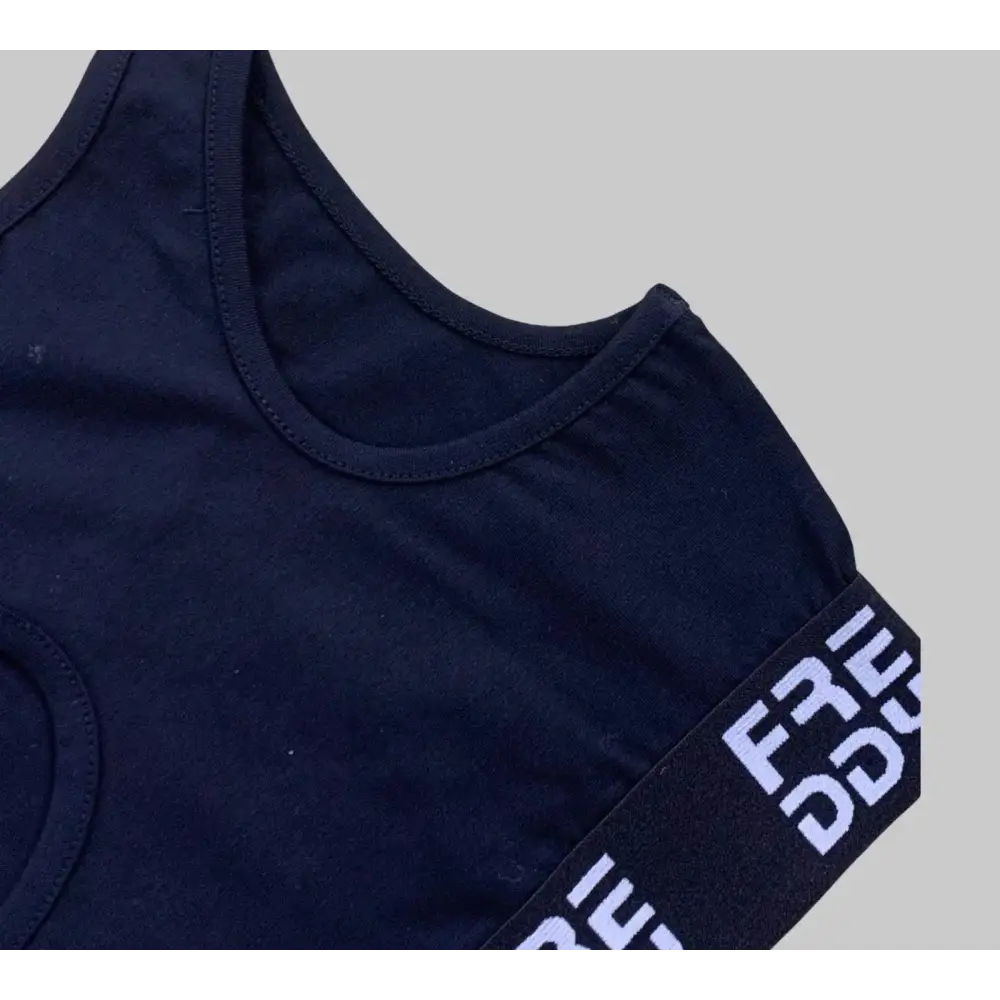 Top corto sportivo bambina Freddy in tessuto nero con dettagli elastici a contrasto