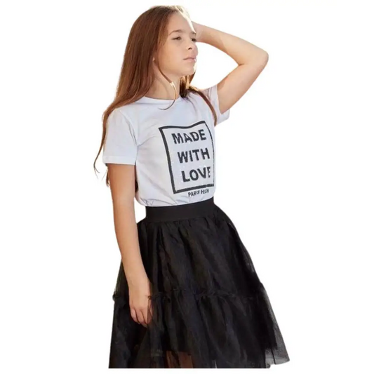 Ragazza con t shirt bianca e gonna tulle bambina Paris Hilton nera a strati per occasioni eleganti