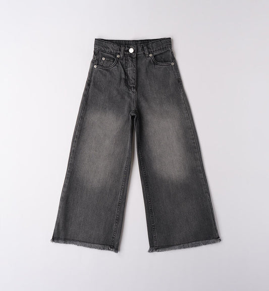 Jeans ragazza Sarabanda in denim nero con taglio ampio e orlo sfrangiato