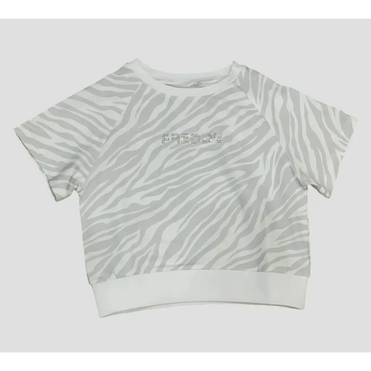 Maglietta ragazza Freddy bianca con motivo zebrato grigio e logo centrale in strass