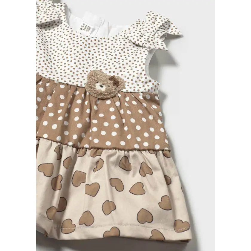 VESTITO SENZA MANICA VOLANT NEONATA Mayoral con motivi a pois e cuori e decorazione orso sul davanti