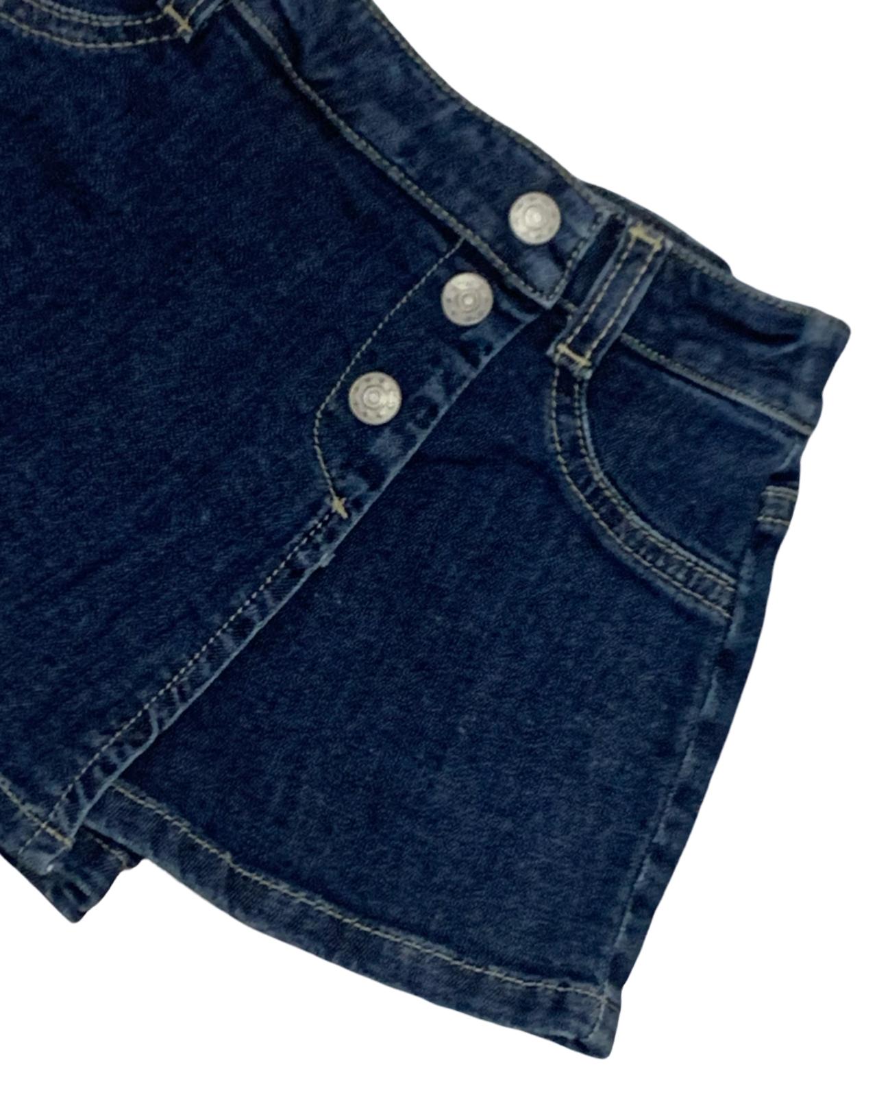 Pantaloncini gonna bambina autunno in jeans blu con bottoni e tasche, perfetti per la stagione autunnale