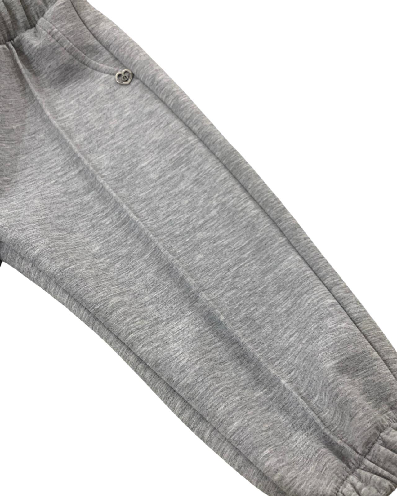 Pantalone baggy grigio melange bambina con elastico e polsini in tessuto morbido e comodo