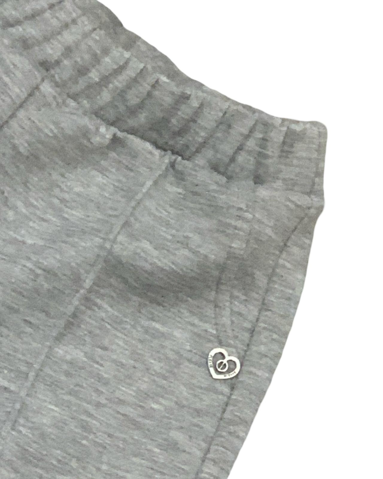 Pantalone baggy grigio melange bambina con elastico e polsini dettaglio vita e decorazione cuore