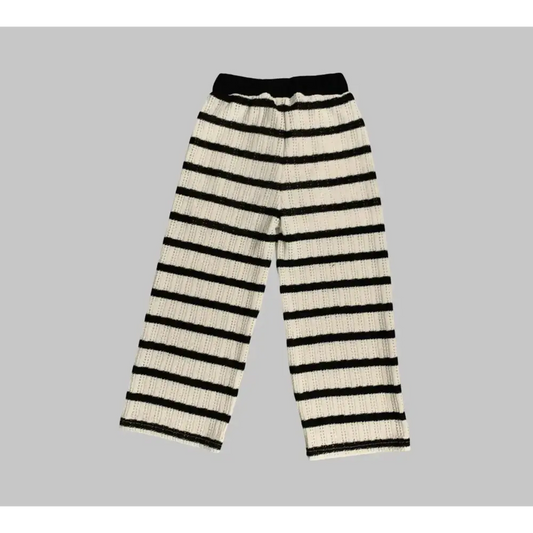 PANTALONE IN MAGLIA RIGATA PER RAGAZZA a righe bianche e nere di Y-Clù con design comodo