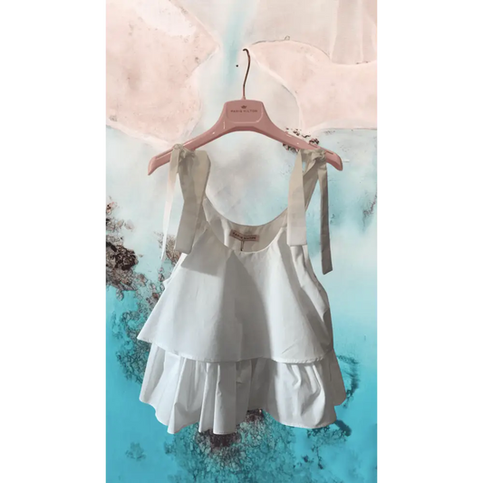 Top Bianco per bambina e ragazza PARIS HILTON con spalline a fiocco e balze leggere