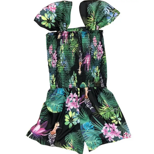 tuta fantasia tropicale bambina con corpetto smock spalline a fiocco e shorts estivi su fondo nero