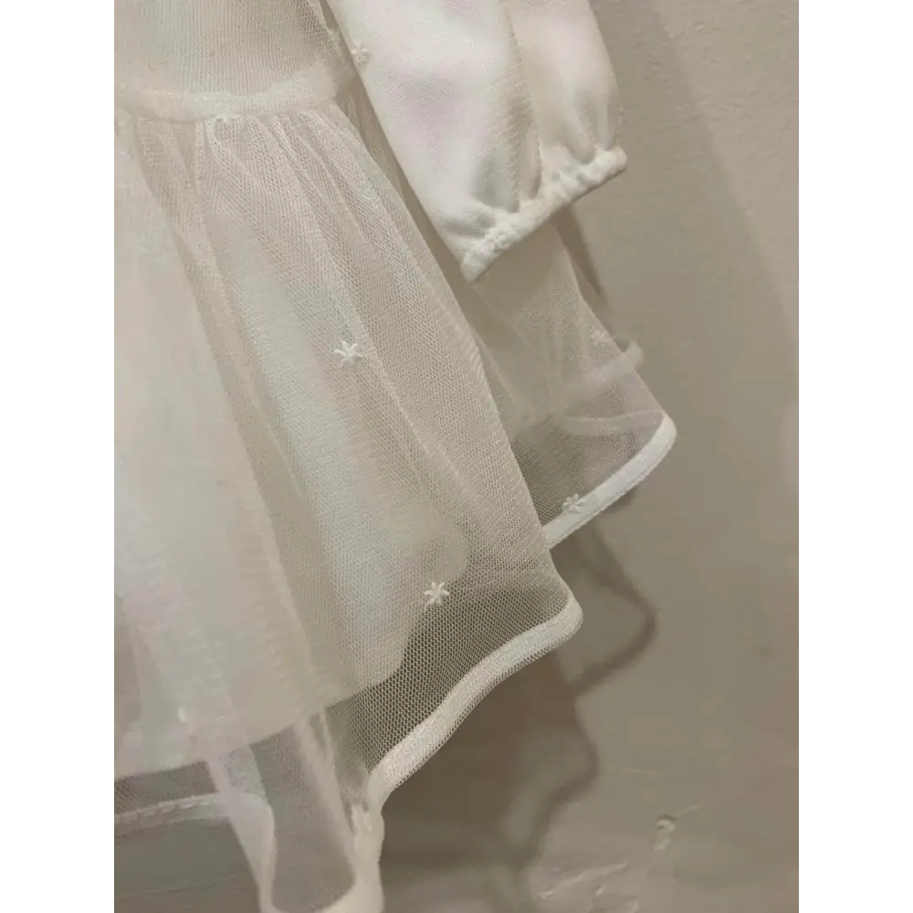 Vestito tulle panna neonata Mayoral con dettagli delicati e maniche lunghe morbide