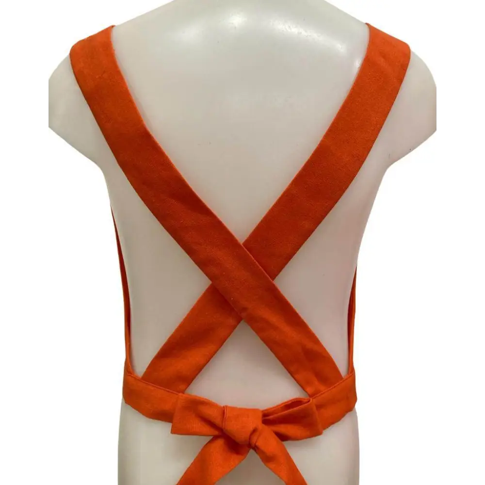 top ragazza Yclù estate arancione con spalline incrociate a croce e fiocco regolabile sulla schiena in cotone