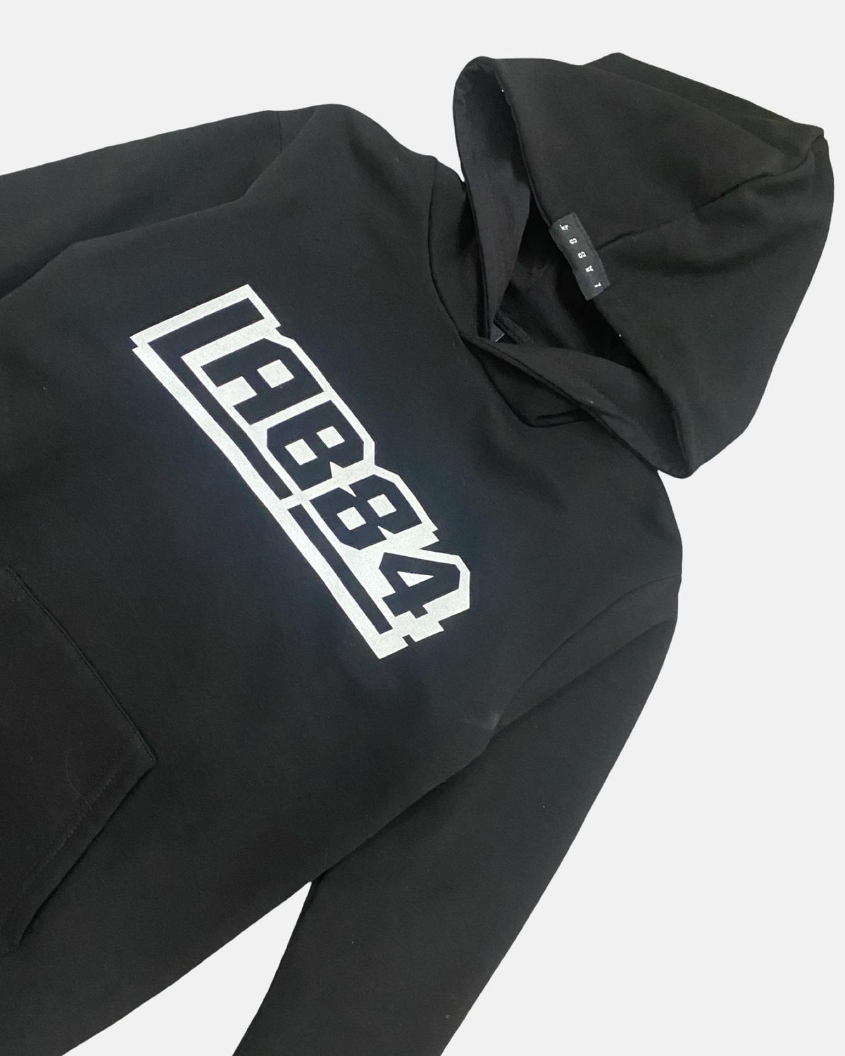 Felpa Ragazzo LAB84 Oversize Nera con Cappuccio e Logo Bianco - OOPS by BabyBimbo 0-16