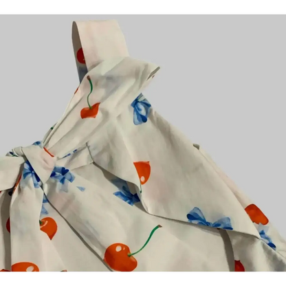Abito estivo fiori bambina bianco con stampa ciliegie rosse e fiocchi blu elegante di Y-Clù
