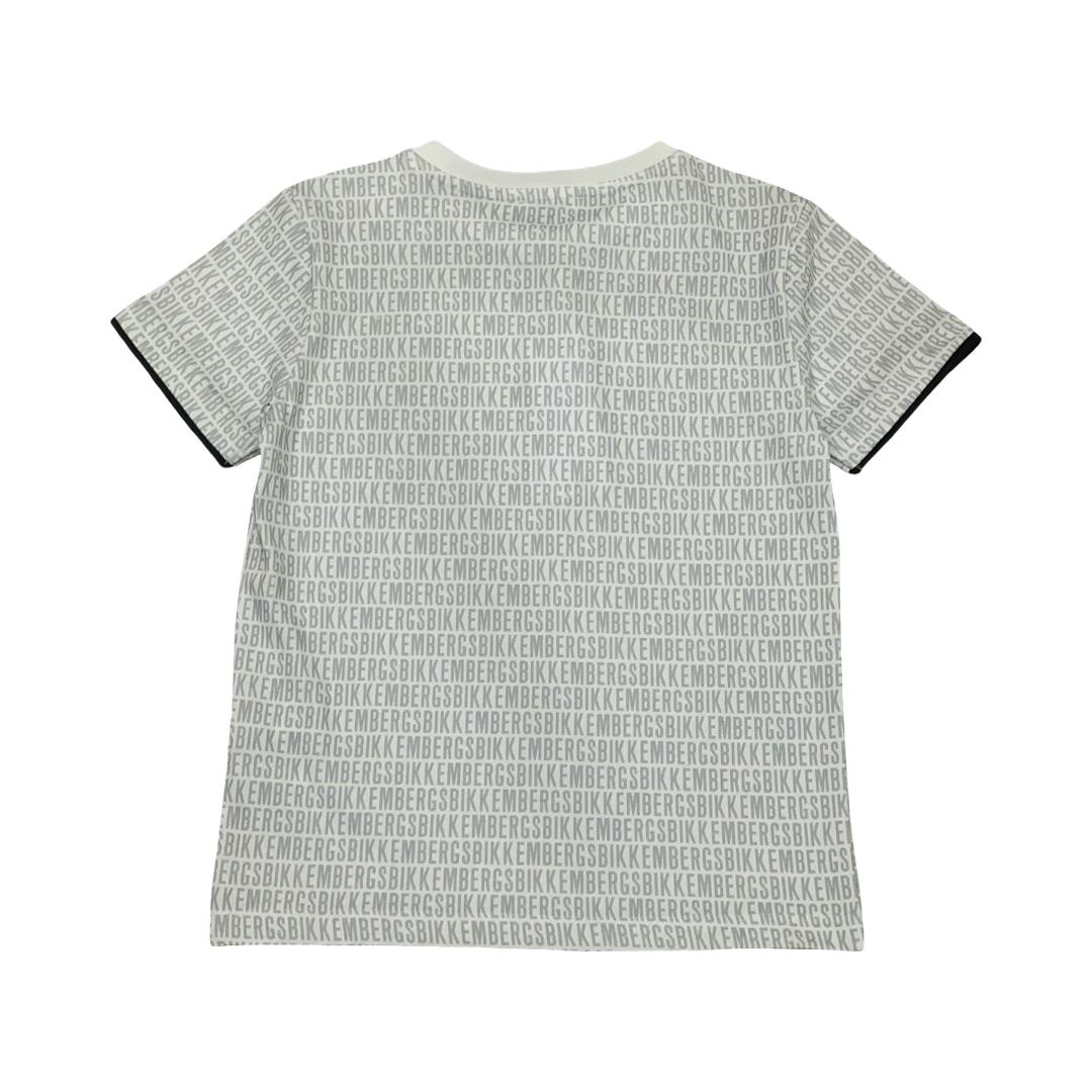 Maglietta Bikkembergs ragazzo con design a logo ripetuto su sfondo grigio chiaro