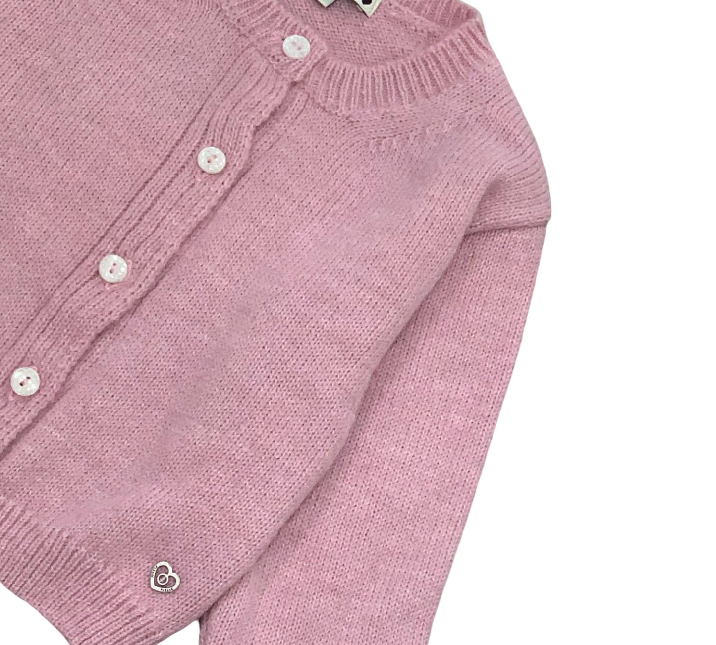 Cardigan rosa bambina con bottoni bianchi e colletto elegante per il guardaroba delle più piccole