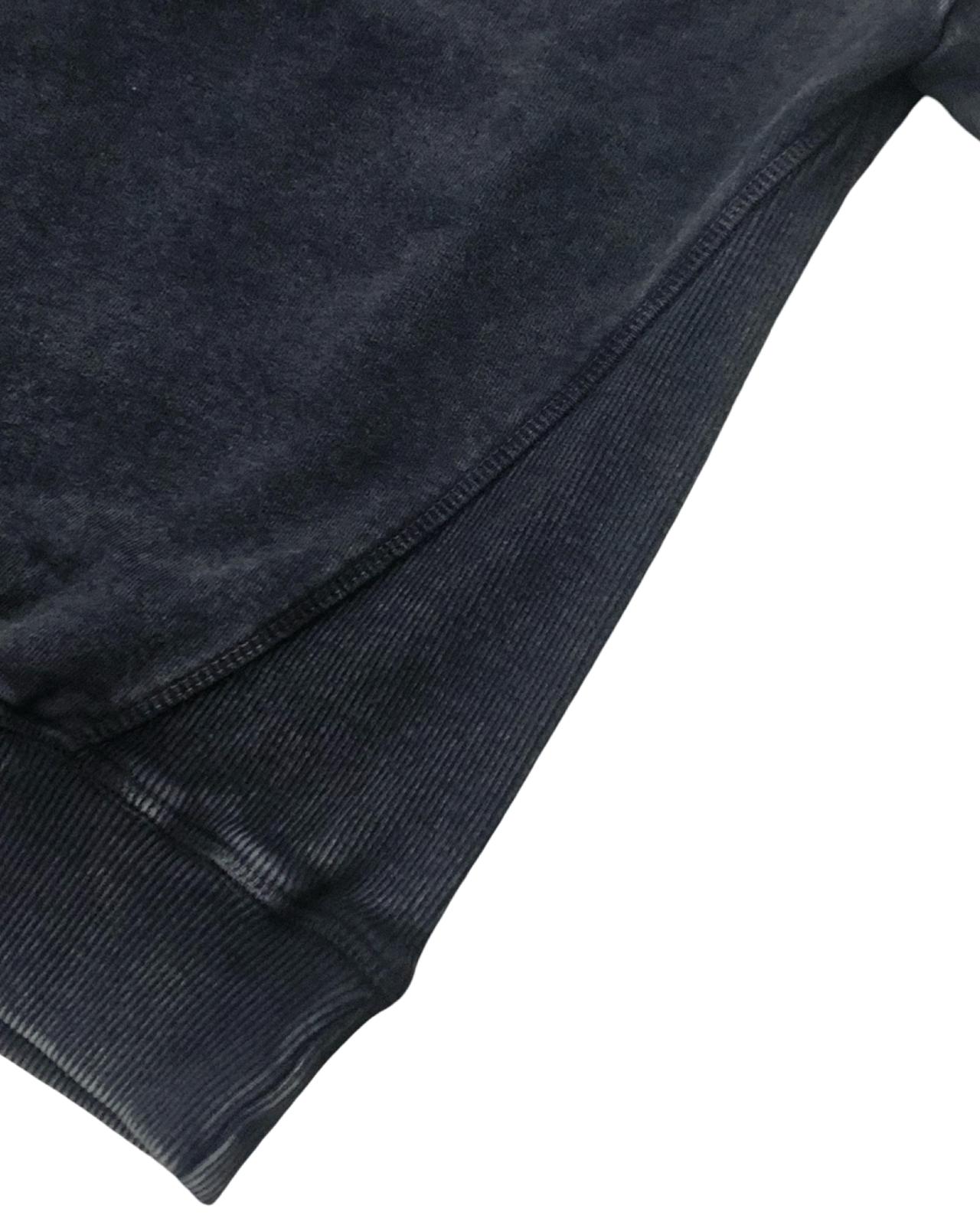 Felpa nera bambino cotone di Retour con maniche lunghe e finiture a costine