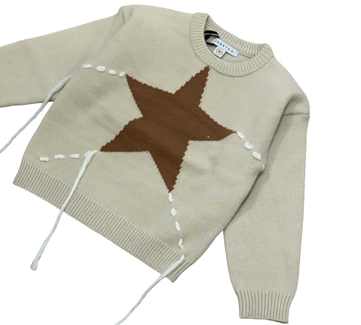 Maglione beige per bambina con stella marrone e dettagli bianchi, ideale per ogni occasione