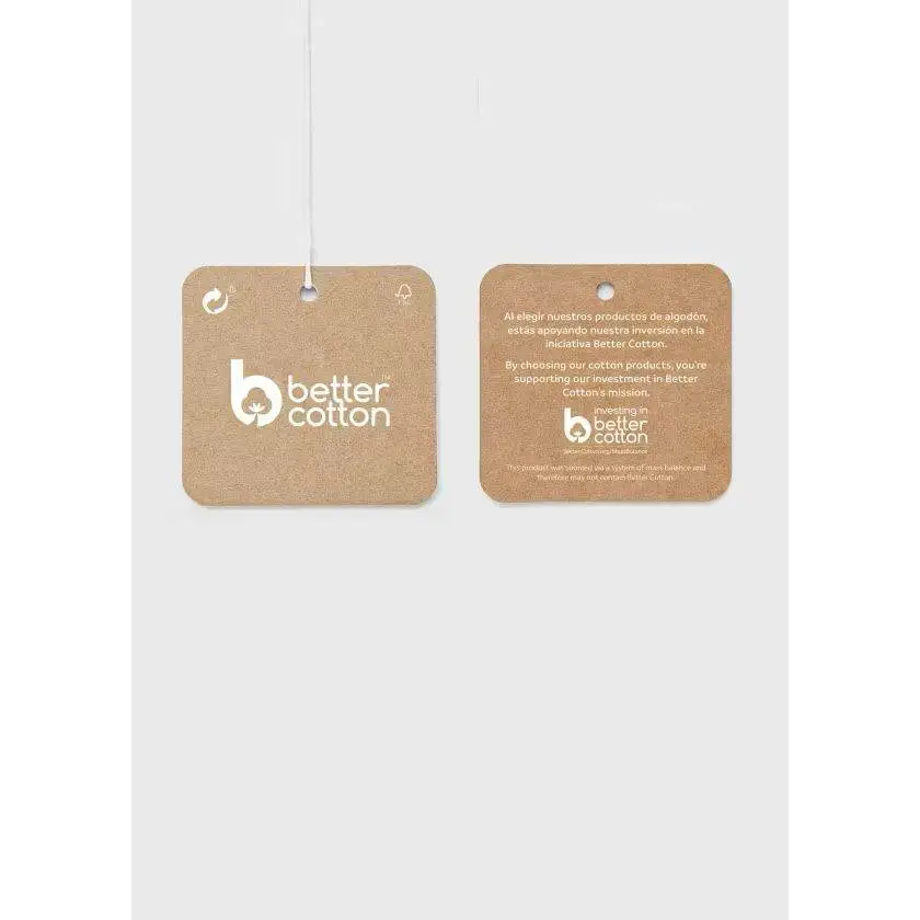 Etichetta Better Cotton su pagliaccetto finta salopette con fascia neonata Mayoral in cotone sostenibile