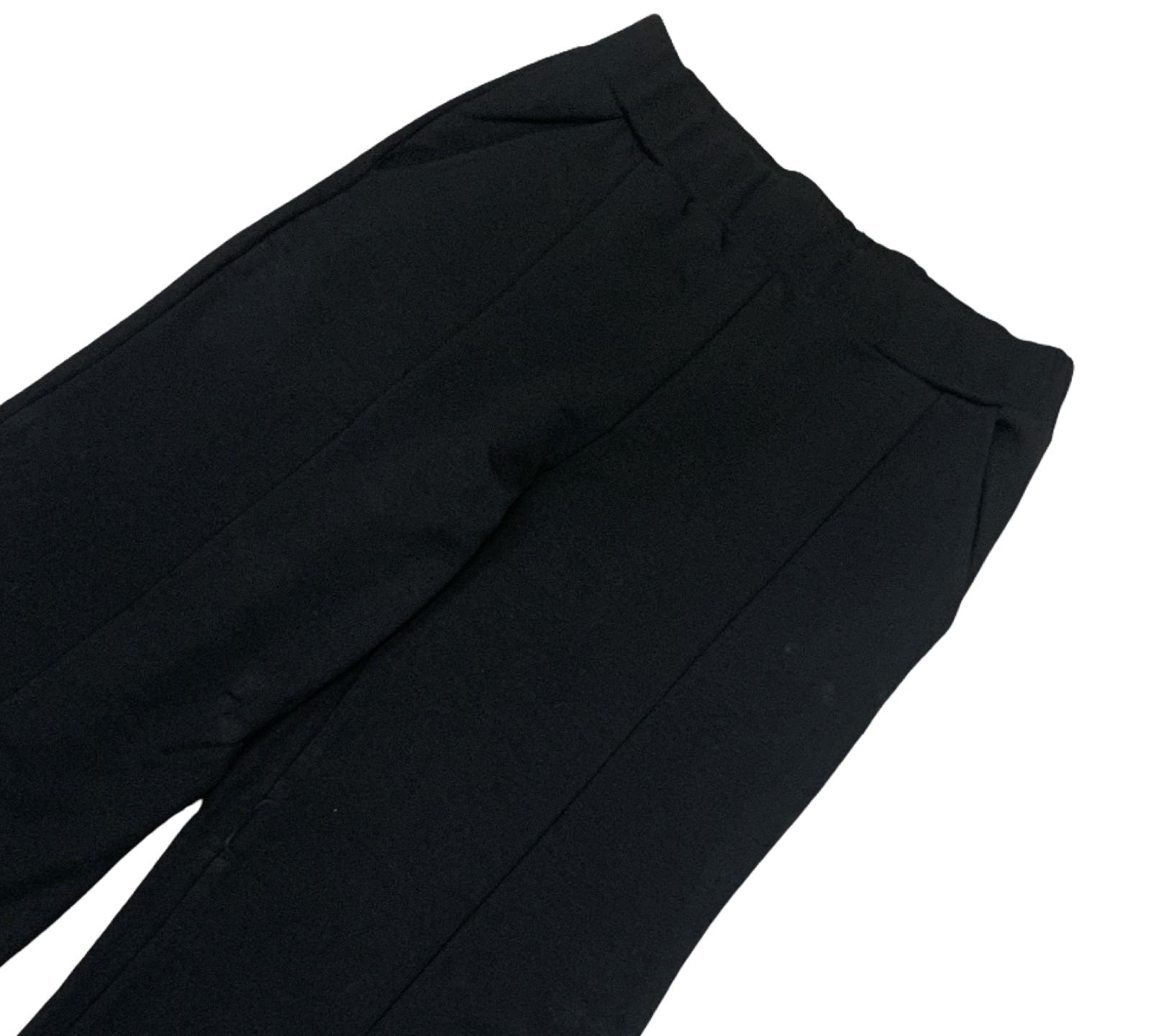 Pantalone Nero Largo con Spacchi e Logo Brillantini di Freddy, ideale per un look elegante e alla moda
