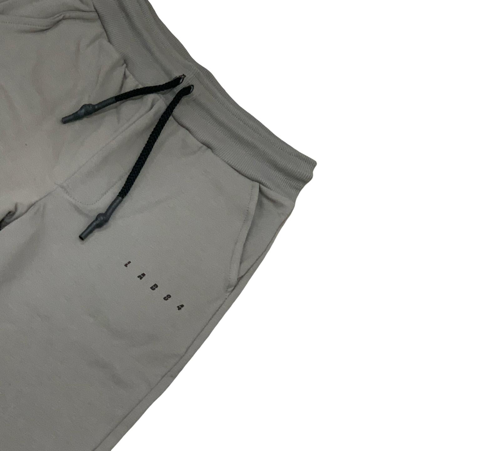 Pantaloni felpa grigi bambino Lab84 con tasche e coulisse per comfort e stile casual
