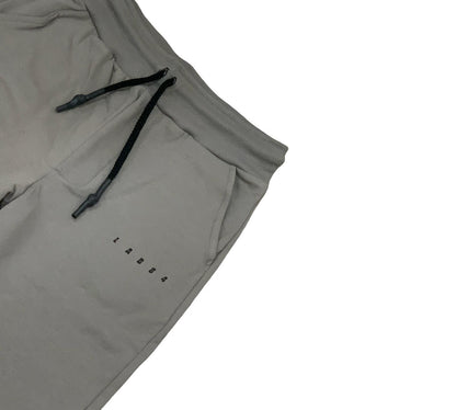 Pantaloni felpa grigi bambino Lab84 con tasche e coulisse per comfort e stile casual