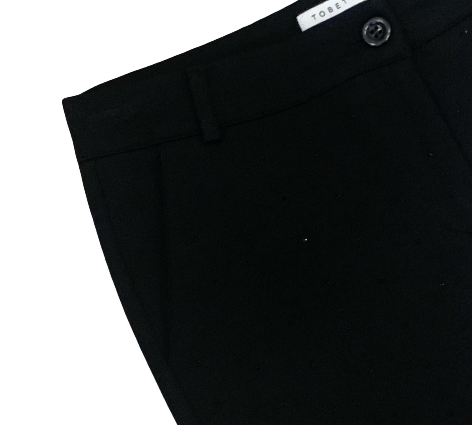 Pantaloni neri a zampa ragazza di Tobetoo con cintura e tasche laterali eleganti