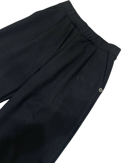 Pantaloni neri larghi ragazza con vita elasticizzata e dettagli eleganti