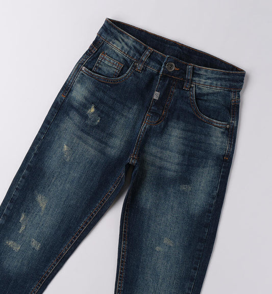 Jeans ragazzo Sarabanda in denim scuro con effetto sbiadito e dettagli strappati