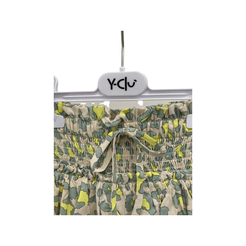 gonna bambina Yclù 3-7 anni in cotone con vita arricciata e fiocco stampa camouflage verde e giallo su appendiabiti