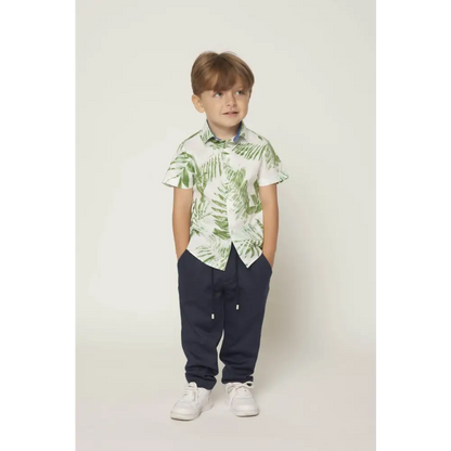 Bambino che indossa pantaloni stretch bambino 3-7 anni blu navy con coulisse e polsini elastici